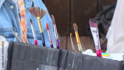 Many different professional paint brushes close-up. Creative space.