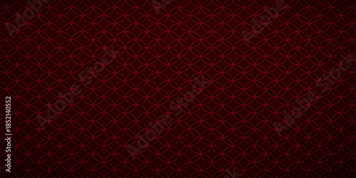 Seamless abstract red leather background featuring a dark carbon fiber texture and metallic mesh grid pattern for a modern technology wallpaper design
