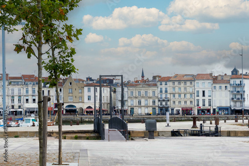 Vieux Port of La Rochelle (Charente-Maritime). Footbridge providing access to the Quai du Carénage, Valin Square and Quai Duperré with view of the Town Hall Tower
