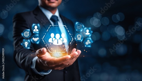 Business professional shows digital icons representing teamwork and innovation in a business setting during evening hours