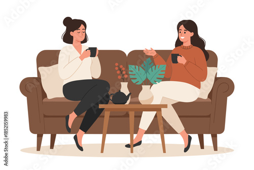 Two women relaxing on a sofa with coffee and plants