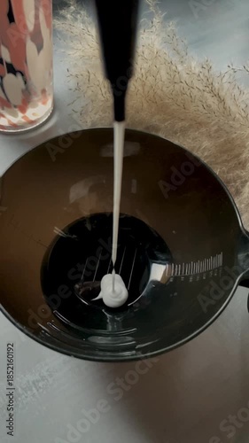 pouring milk into a glass