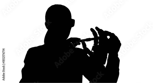 Young woman working with a robotic arm in a laboratory setting.