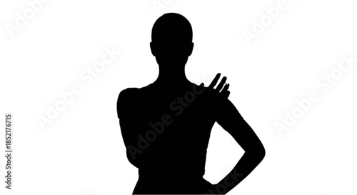 Young woman with a robotic arm looks thoughtfully at the camera.