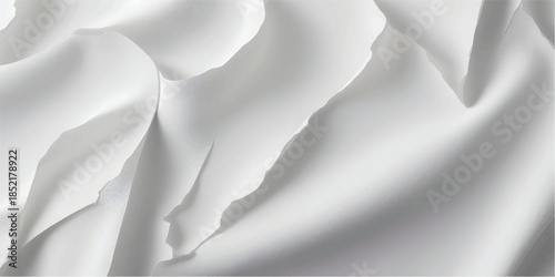 Luxury white silk and satin fabric texture featuring soft waves and smooth curves creates a light cream material design perfect for a wedding backdrop or elegant wallpaper surface