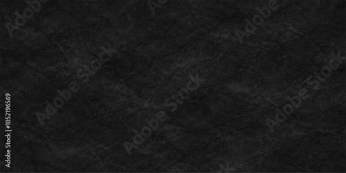 A dark textured black leather material featuring a rough grunge pattern on a blank cloth surface suitable for a fabric wallpaper or old textile backdrop design.  gray, wall, backgrounds, brown
