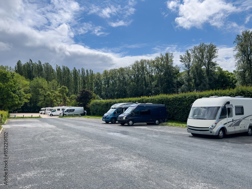 Bild auf Leinwand Camper vans parking in Chenonceaux, France, during summer vacation