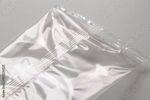 Transparent polyethylene packaging with a longitudinal seal, macro shot of smooth film, industrial packaging material for goods