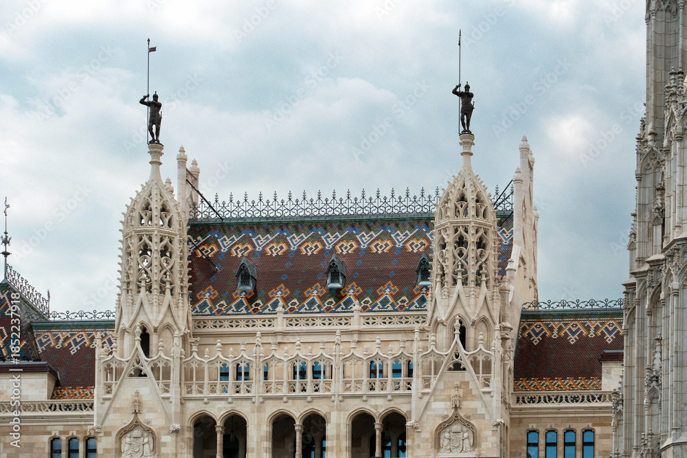 Fototapeta premium Historical Building Beauty, Ornate Limestone Carvings And Vibrant Tiles On Historic Structure