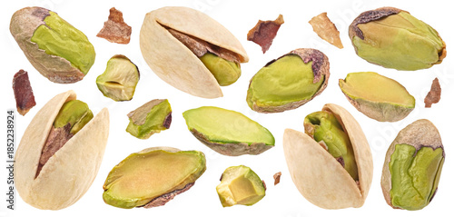 Fotografie Pistachios whole and chopped isolated on white background, full depth of field