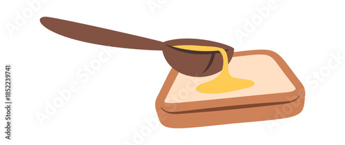 Wooden spoon pouring fresh honey