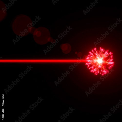 Powerful red laser beam striking a point, creating a vibrant