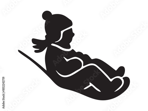 Black silhouette icon of child sledding downhill, isolated on white background. concept of winter, fun, snow, childhood adventure, outdoor activity, design element