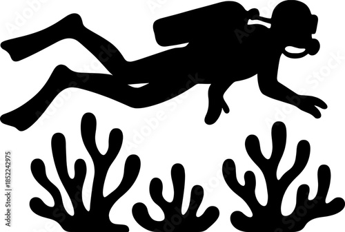 Silhouette of scuba diver exploring coral reef underwater