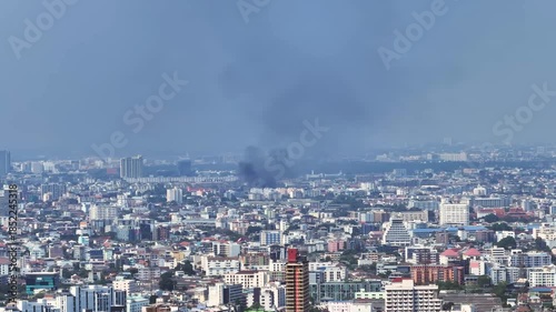 Wallpaper Mural Fire incident in Bangkok city causing smoke and flames in urban area Torontodigital.ca