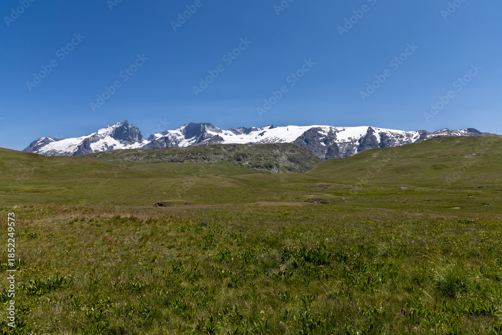 Fototapeta premium Mountain landscape of the Emparis Plateau in the Arves Massif, Hautes-Alpes, France.