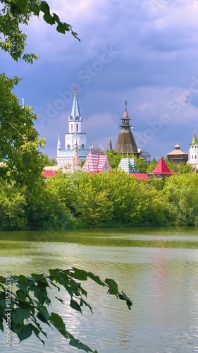 Russian traditional architecture, the Kremlin in Izmailovo, on the shore of a pond, Moscow. The architectural ensemble is stylized under Russian architecture of the 16-17 centuries. Gingerbread houses