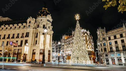 Christmas Timelapse of Metropolis Building with Traffic and Lights in Madrid, Spain 2025