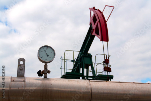 Pipes and caps for pipelines leading from oil and gas fields to storage tanks, energy self-sufficiency concept, global market forecast concept