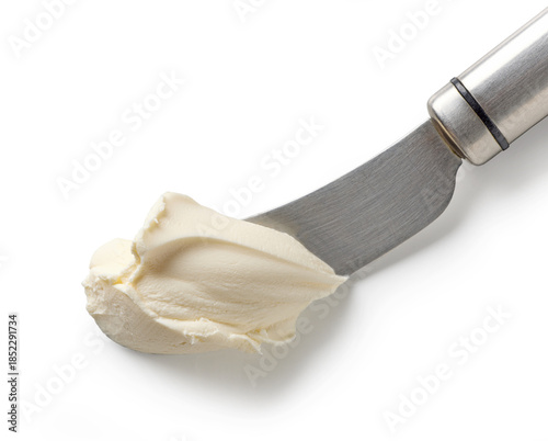 fresh cream cheese on knife