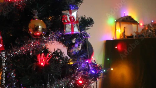 festivity lights at home, Christmas tree and Nativity scene