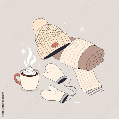 Cozy winter essentials with a warm hat scarf gloves and a hot beverage on a neutral background