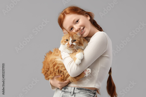 Redhead teenage girl huggin...