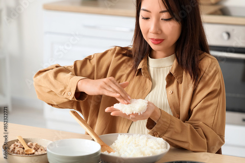 Young Asian woman preparing...
