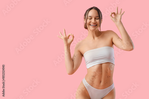 Young woman with marks on h...