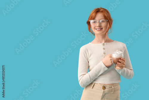 Teenage redhead girl with c...