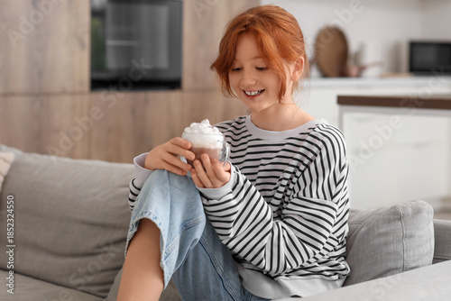 Teenage redhead girl with c...