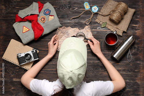 Female scout with map and a...