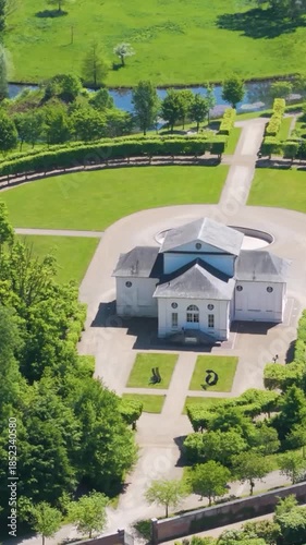 château seneffe adjacent theater building green parks surrounding art installation grounds nearby water bodies to left right pans aerial of de belgium 