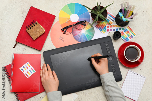 Female graphic designer wor...