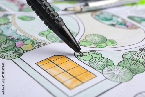 Pen with zoning plan, closeup