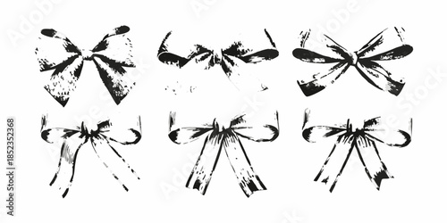 Rough brushstroke illustrations of decorative black ribbons in various orientations