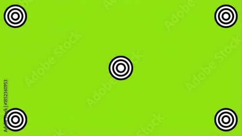 Concentric circle target markers on green background