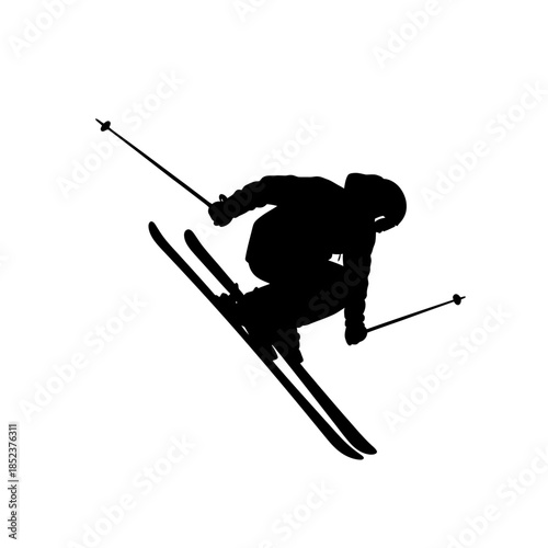 Dynamic male skier jumping high during downhill skiing, isolated white background.