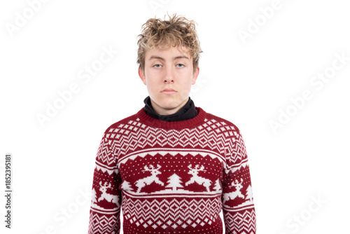 Sullen teenage boy unwillingly wearing a Christmas Sweater