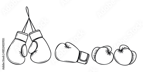 Collection of boxing gloves in various positions, perfect for sports themes, fitness content, and competitive event promotions.