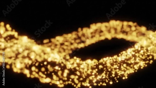Dynamic golden glowing particle stream creating an elegant abstract wave on a dark background for energy flow concept and data connection