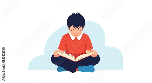 Young Asian boy sitting cross-legged on the floor while attentively reading an open book for education or leisurely enjoyment.