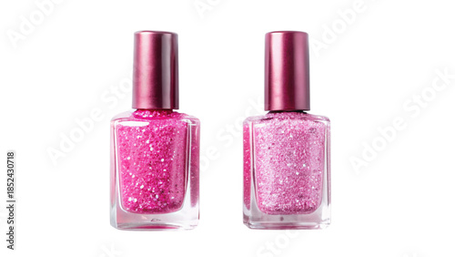 Two bottles of pink nail polish with glitter on black background
