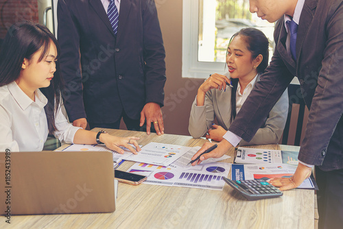 Team business marketing meeting to discuss the situation on business plan, marketing for investment. Selected focus