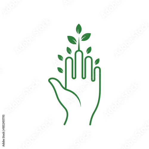 Hand holding plant representing growth and environmental protection concept.