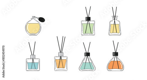 Aesthetic collection of home fragrance items including reed diffusers in various glass bottles and a vintage perfume atomizer.