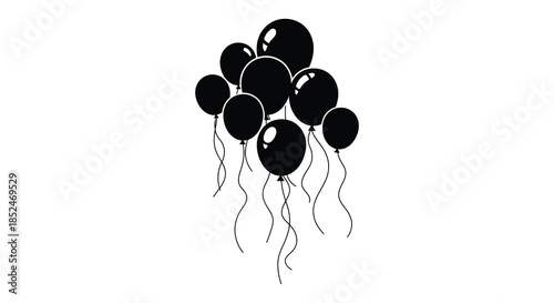A cluster of black balloons floats upwards creating a simple and striking image silhouette