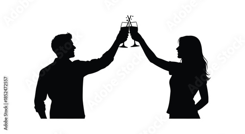 A couple toasting with wine glasses celebrating a special occasion in dark silhouette
