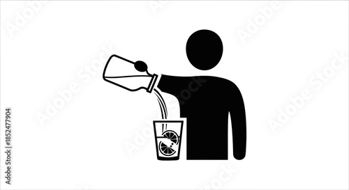 A person pours a refreshing drink from a jug into a glass with a lemon slice.