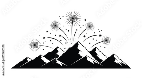 Mountain range with vibrant fireworks exploding above a stunning black and white silhouette
